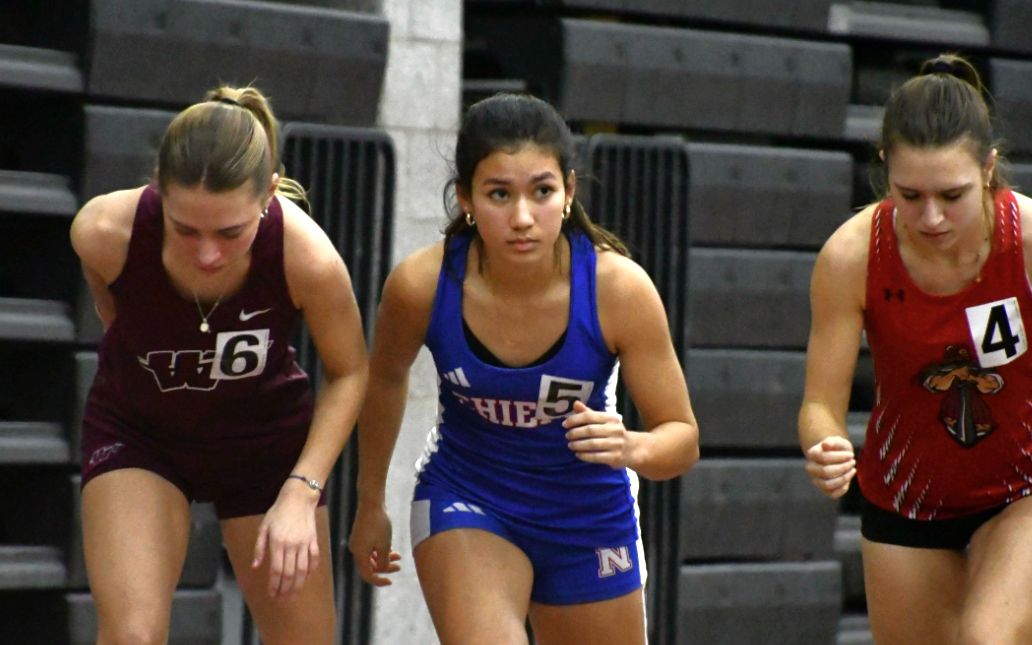 Junior Sophia Garguilo, center, prepares to run the 600 meters race during an indoor track meet on Jan. 6.